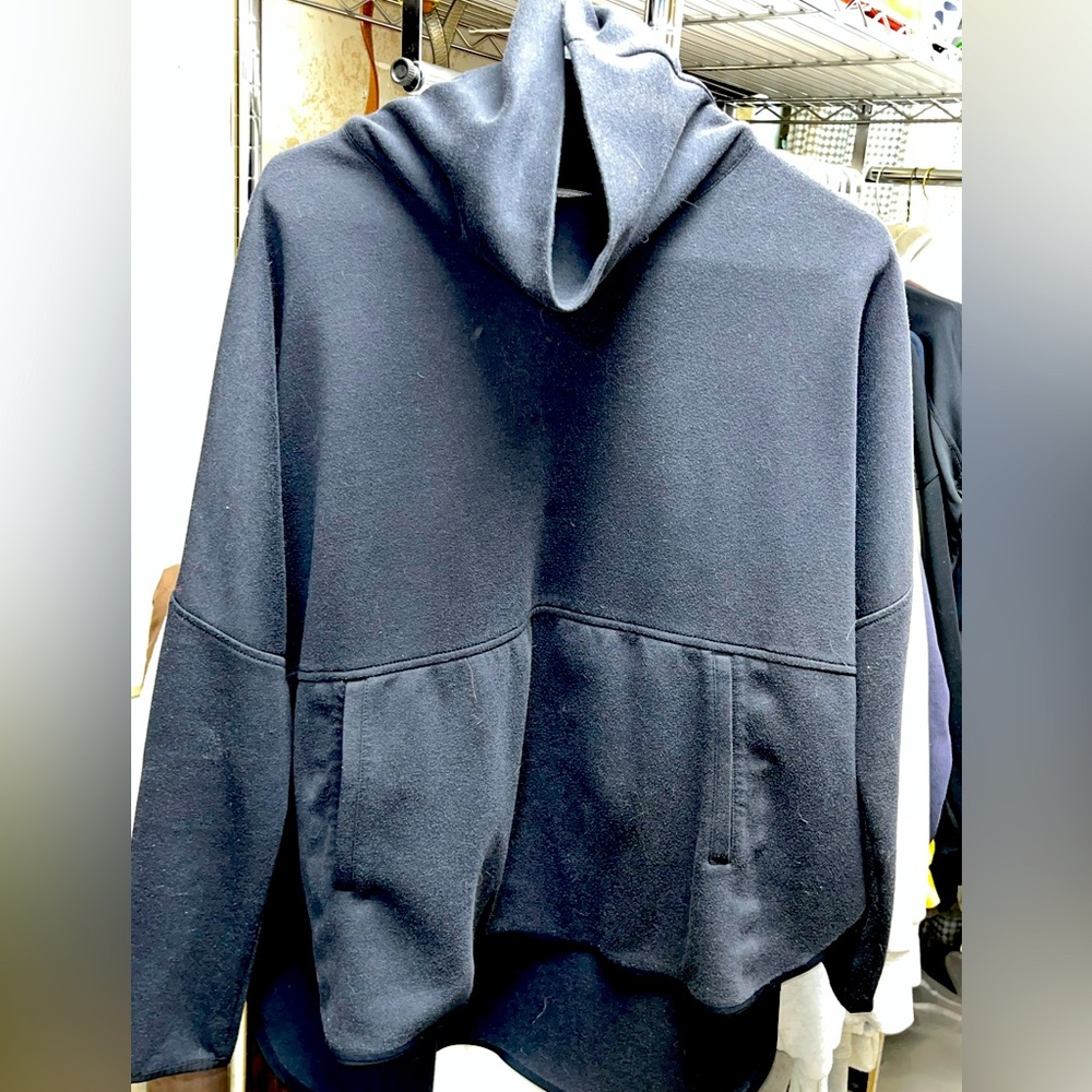 The North Face cow neck sweatshirt. With front pocket and longer in back. MED